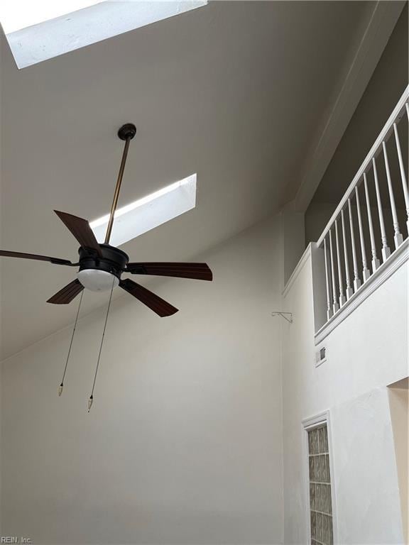 interior details featuring ceiling fan