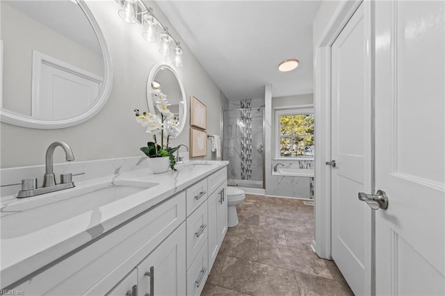 full bathroom with vanity, plus walk in shower, and toilet