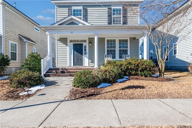 view of front property with covered porch