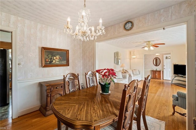 dining room featuring ceiling fan and light hardwood / wood-style floors