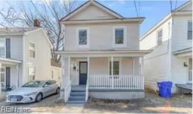 view of front property with covered porch