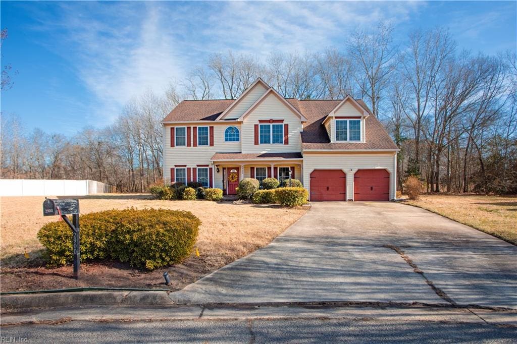 view of front of property with a garage