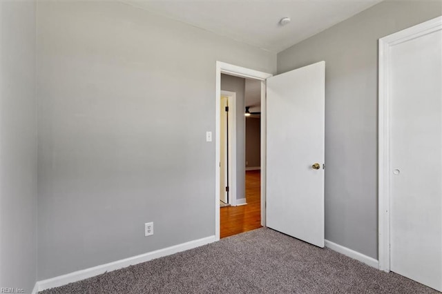 unfurnished bedroom with carpet