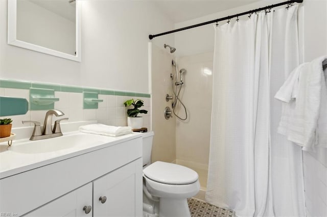 bathroom featuring vanity, a shower with curtain, tile walls, and toilet