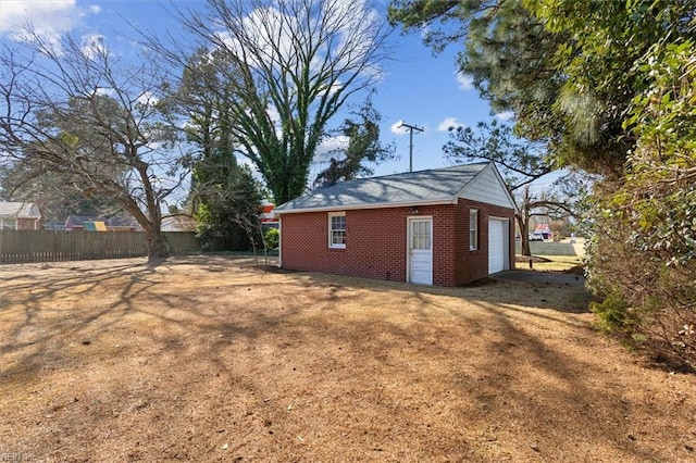 view of outdoor structure with a garage