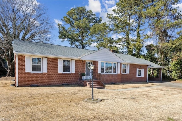 ranch-style house with a carport