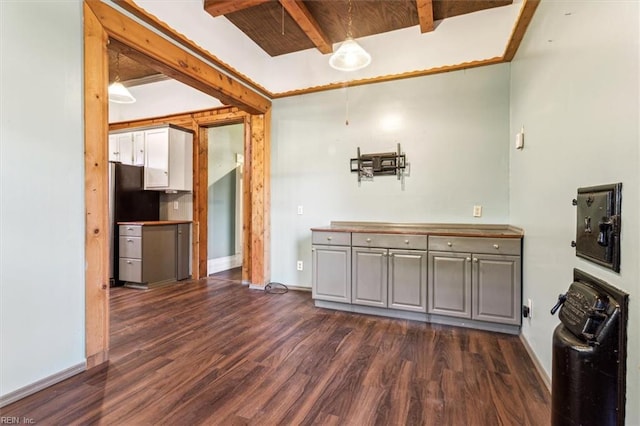 kitchen with dark wood-type flooring, gray cabinetry, wood ceiling, and beam ceiling