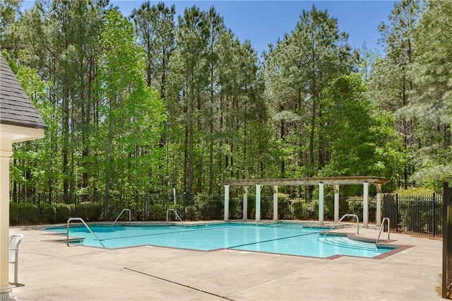 view of swimming pool featuring a patio