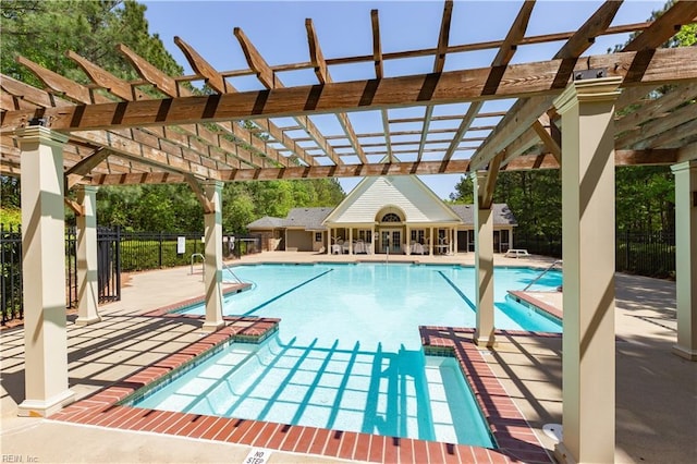 view of pool with a patio area and a pergola