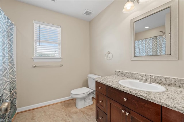 bathroom featuring a shower with curtain, vanity, tile patterned floors, and toilet