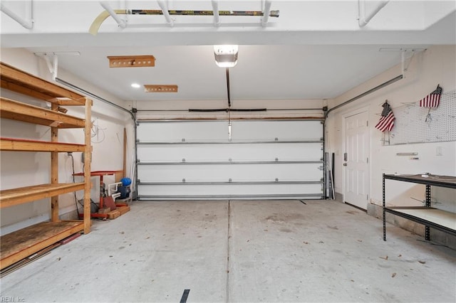 garage featuring a garage door opener