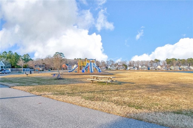 view of play area featuring a lawn