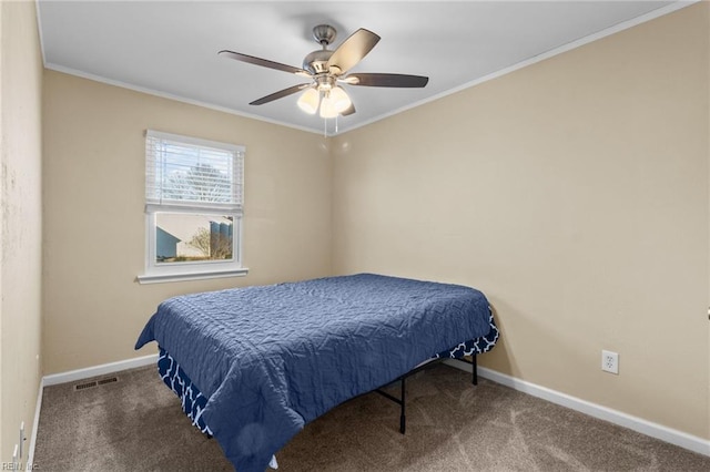 carpeted bedroom with crown molding and ceiling fan