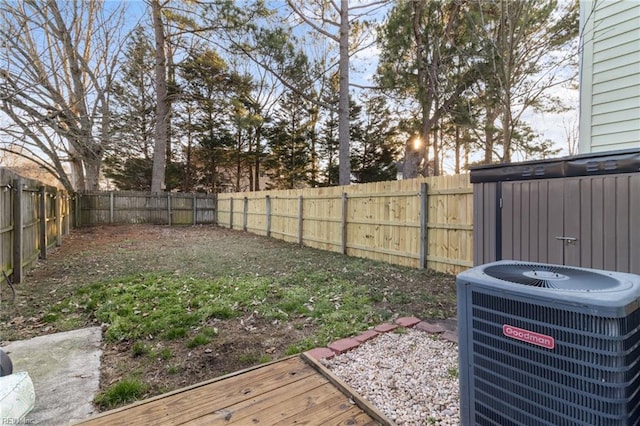 view of yard with central AC unit