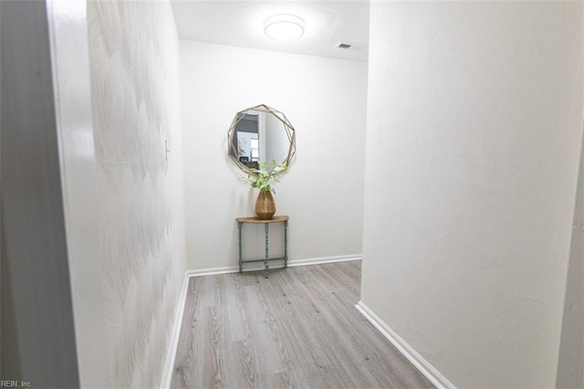 hallway featuring light wood-type flooring