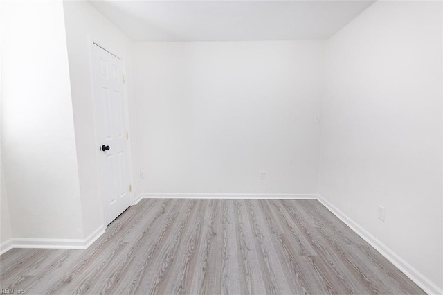 unfurnished room featuring light wood-type flooring