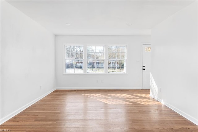 empty room featuring light hardwood / wood-style floors