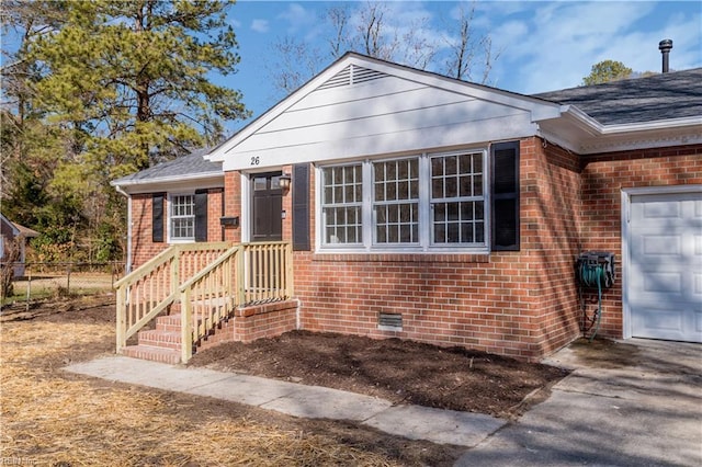 single story home with a garage