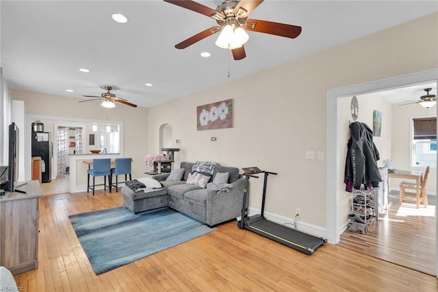 living room with light hardwood / wood-style flooring