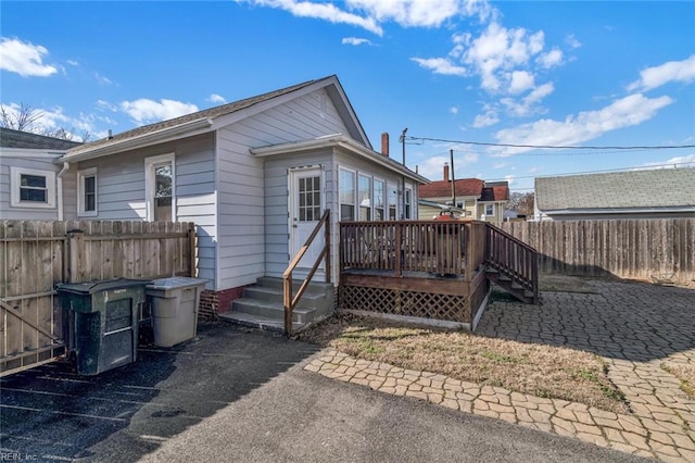 back of property featuring a patio area