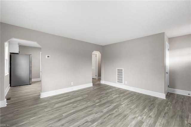 unfurnished living room featuring light hardwood / wood-style floors