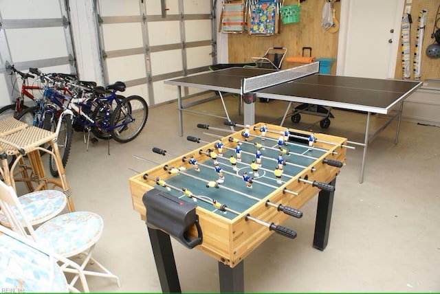 game room with concrete flooring