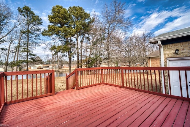 deck featuring a water view