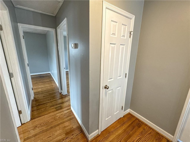 hallway with light wood-type flooring