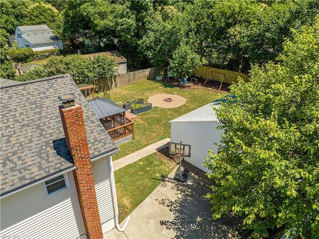 view of yard featuring a gazebo and a fire pit