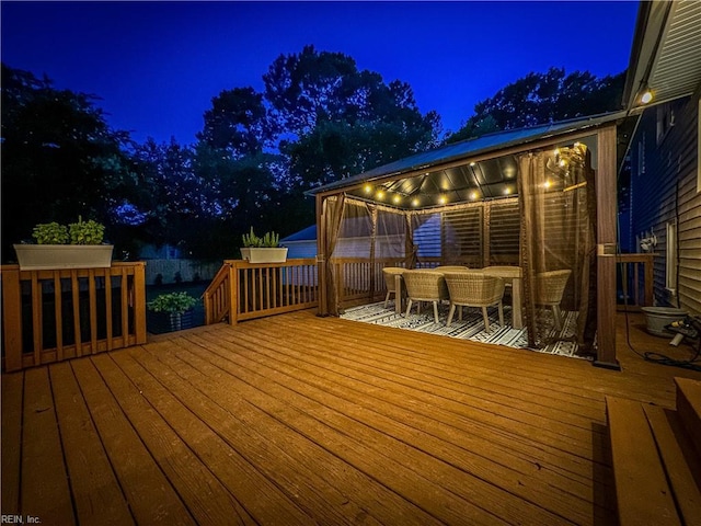 view of deck at night