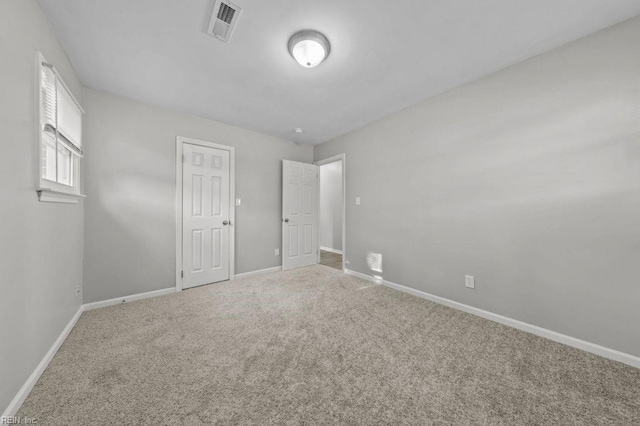 unfurnished bedroom with carpet