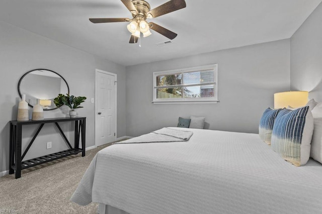 carpeted bedroom with ceiling fan