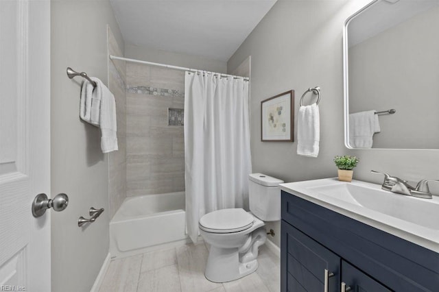 full bathroom featuring vanity, shower / bath combination with curtain, and toilet