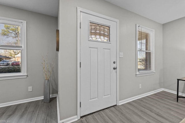 foyer with light wood-type flooring