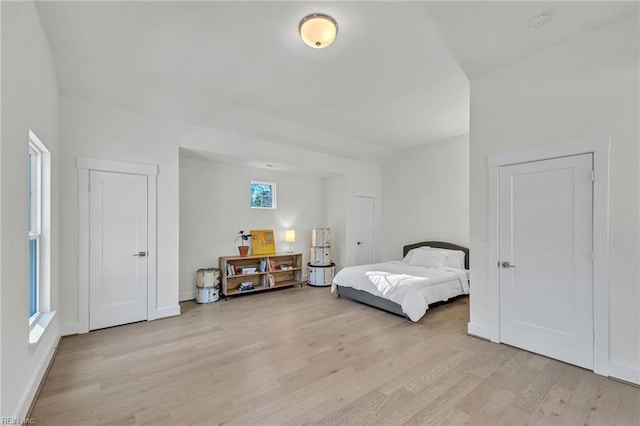 bedroom with light hardwood / wood-style floors