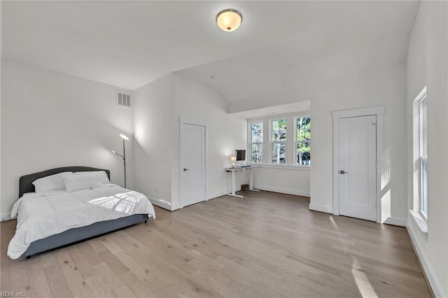 bedroom with light hardwood / wood-style flooring