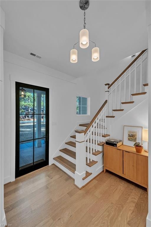 stairway with wood-type flooring