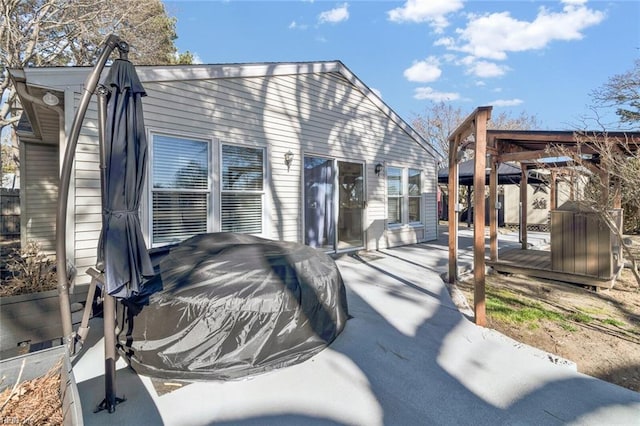 rear view of house with a patio area