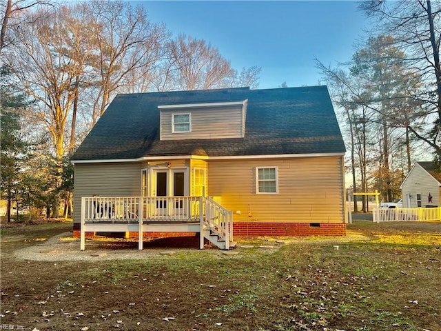 view of front of home with a wooden deck