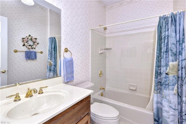 full bathroom with vanity, toilet, and shower / bath combo with shower curtain