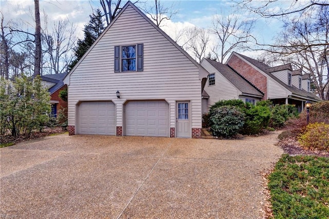 view of property exterior with a garage