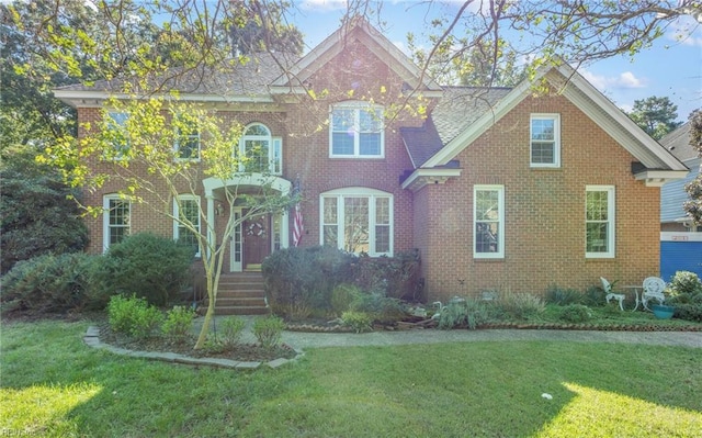 view of front facade featuring a front yard