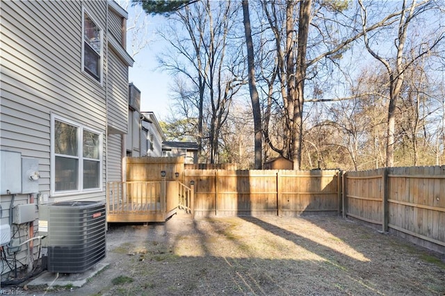 view of yard featuring central AC unit