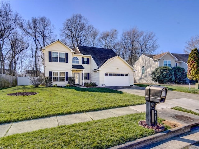 view of front of home featuring a garage and a front yard