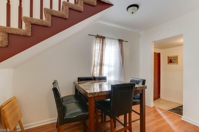 dining room with light hardwood / wood-style flooring