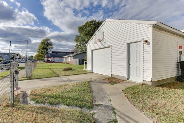 garage featuring a yard