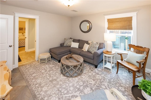 living room featuring tile patterned flooring