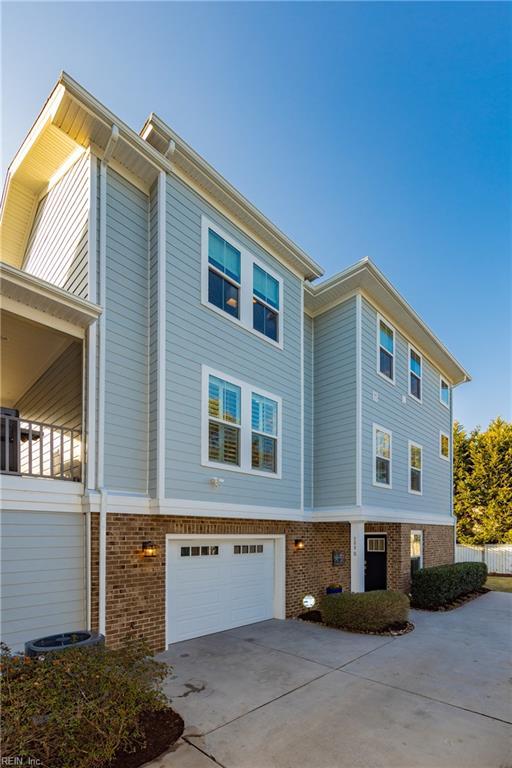 view of property exterior featuring a garage