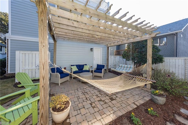 view of patio / terrace featuring a pergola and outdoor lounge area