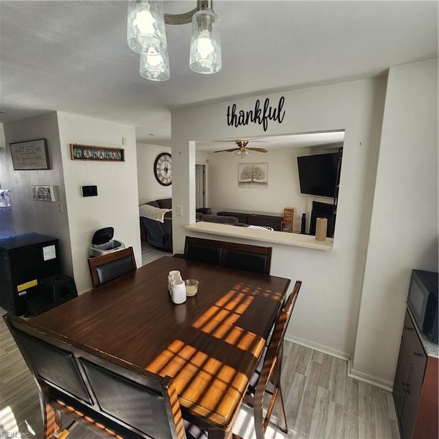 dining space featuring light hardwood / wood-style flooring